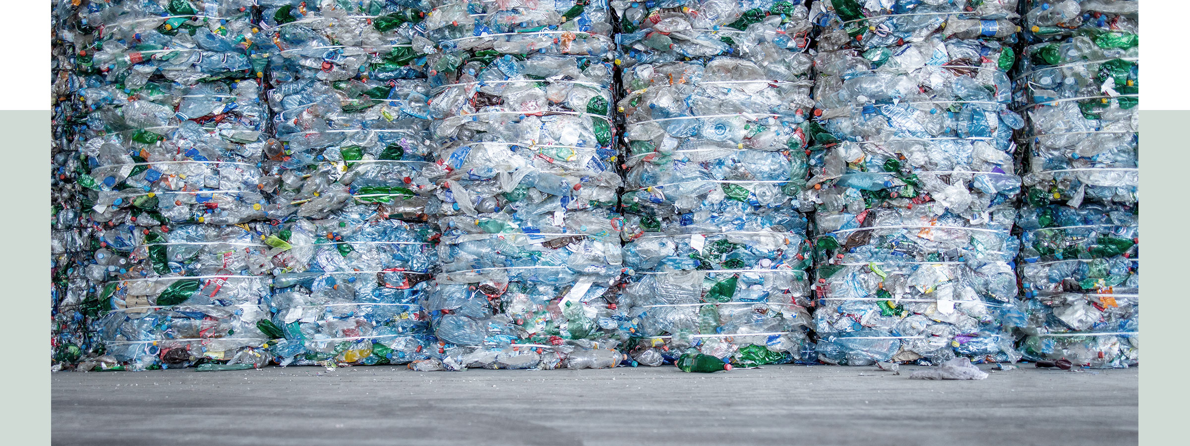 Large stashes of pressed PET bottles ready for recycling